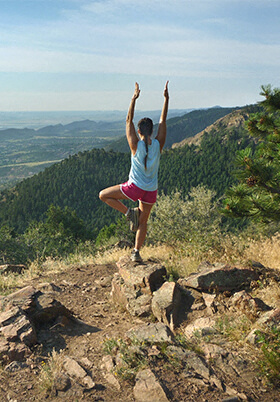 Woman doing yoga pose on trail Woman doing yoga pose on trail near Element 47 by Windsor, Denver, Colorado